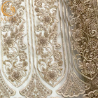 Broderie perlée lourde de tissu de dentelle d'or moderne pour la robe nuptiale