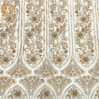 Broderie perlée lourde de tissu de dentelle d'or moderne pour la robe nuptiale