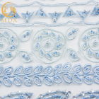 Tissu bleu-clair africain de dentelle de la broderie 3D fait main pour des robes habillées