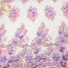 La main molle de polyester du tissu 135cm Widh Tulle de dentelle de la fleur 3D a brodé le tissu net