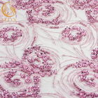 Le tissu perlé lourd de dentelle de rose de robe de mariage a adapté le polyester aux besoins du client de 20%