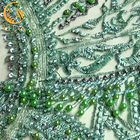 Le tissu perlé vert sophistiqué de dentelle/lacent le tissu matériel pour la robe nuptiale