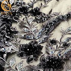 Tissu brodé décoratif noir de dentelle à la mode avec des fausses pierres