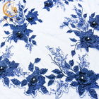 La robe l'épousant bleu-foncé lacent le tissu décoration de 55 de pouce fausses pierres de largeur