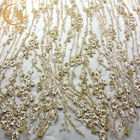 La dentelle de broderie de machine de largeur de l'or 140cm a adapté le tissu aux besoins du client de dentelle pour des robes