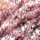 Le tissu fuchsia de dentelle d'ODM a brodé le nylon de 80% avec la décoration de scintillement